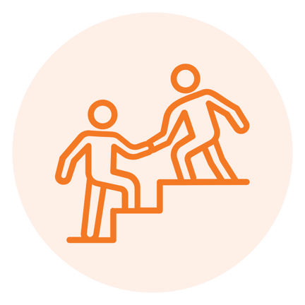 A large group of staff members standing together and smiling for a group photo